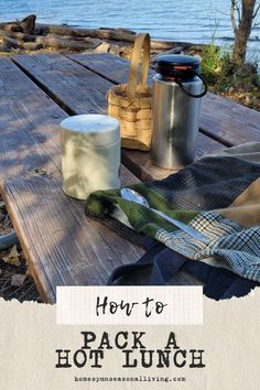 a picnic table with food and water on it