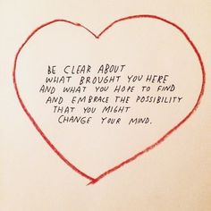 a heart drawn with red crayon on top of a piece of paper that says, be clear about what brought you here and what you hope to end and embrace the posit