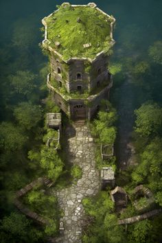 an aerial view of a stone building in the middle of some green trees and bushes