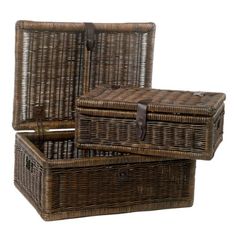 two brown wicker baskets sitting next to each other