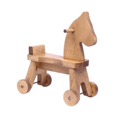 a wooden toy horse sitting on top of a white background with the wheels extended to it's sides