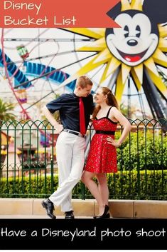 a man and woman standing next to each other in front of a ferris wheel with text that reads, have a disneyland photo shoot