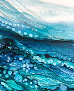 an abstract painting with blue water and bubbles