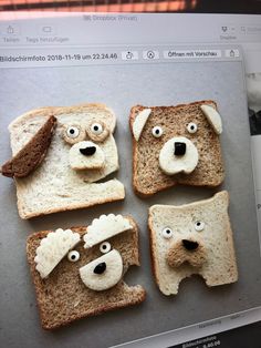 four slices of bread with faces on them