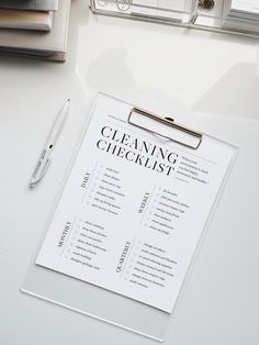 a cleaning checklist sitting on top of a desk next to a pen and glasses