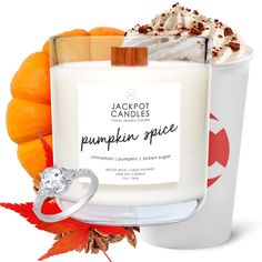 pumpkin spice candle surrounded by fall leaves and an orange with a diamond ring on it