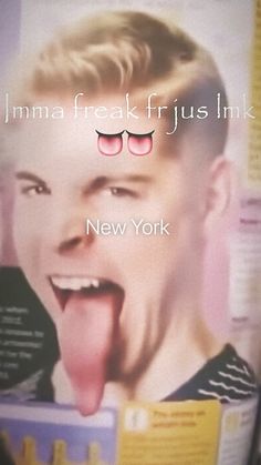 a man sticking his tongue out in front of a poster with the words new york on it