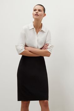 The Cobble Hill Skirt—Origami Suiting - Black | M.M.LaFleur Classic Relaxed Mini Skirt For Office, Versatile Flowy Skirt For Work, Classic Flowy Skirt For Office, Business Pencil Skirt With Lining, Modern Workwear Mini Pencil Skirt, Classic Lined Mini Skirt For Office Wear, Modern Pencil Mini Skirt For Workwear, Flowy Pencil Skirt For Office, Modern Pencil Mini Skirt For Work