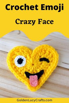 a crocheted heart with the words crazy face emoji on it