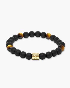 Introducing the men’s Sunset Blvd tiger's eye bracelet. We've taken the same black onyx beads on our Hidden Hills bracelet and added tiger’s eye stones to recreate a golden hour glow. Upgrade to our Gold Bracelet Stack to collect this bracelet as a set with the gold Avenue Cuff.