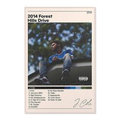 the front and back cover of 2011 forest hills drive, featuring a photo of a man sitting on top of a car