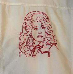 This is a hand embroidered Dolly Parton jacket. Every fan needs one of these in their closet. Whether you are buying for a friend or yourself, this jacket is sure to be a showstopper and a compliment magnet. Jackets are sourced from many locations, so sizes and styles will vary slightly from product photos. Please message me with any questions. Embroidered on a blue jean jacket unless otherwise requested. *Each jacket is hand embroidered and takes many days to complete. Thank you for considering Dolly Parton Embroidery, Blue Jean Jacket, Dolly Parton, Product Photos, Blue Jean, Embroidery Art, Jacket Style, Fiber Art, Jean Jacket