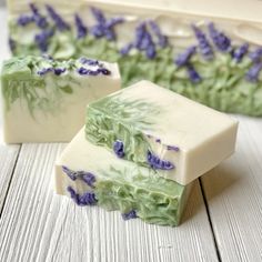 two bars of soap with lavender flowers on them