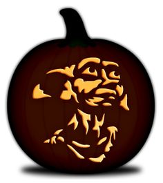 a carved pumpkin with an image of a man's face on it