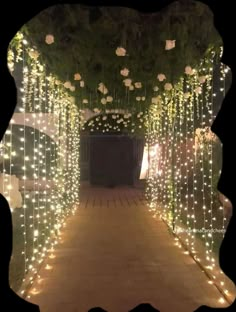 the walkway is decorated with lights and flowers