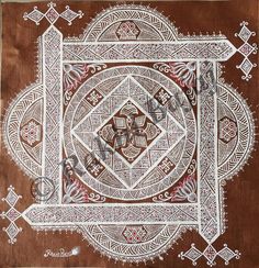 an intricately designed piece of cloth with white and red designs on brown fabric,