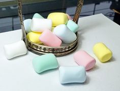 small marshmallows are sitting on a table