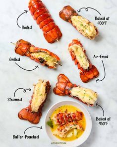 lobster skewers with different types of sauce on them