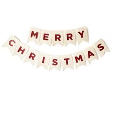 merry christmas banner hanging from the side of a white wall with red letters on it