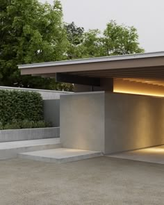 an open garage with lights on the side and concrete steps leading up to it's entrance