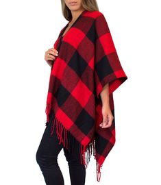 "This cozy chic knit poncho features a bold plaid print with fringe trim, and lightweight, flowing material that is comfortable and warm. Wear with your favorite boots for a stylish, yet casual look on chilly days. Material: 100% Acrylic Sizing: One size fits all Garment Measurements: 46\" x 55\" Model Measurements: Bust: 32\" Waist: 26\" Hips: 36\" Height: 5'5 We are taking steps towards sustainability! Your order will be packaged in tissue paper made from recycled materials and a biodegradable Ruana Wrap, Plaid Shawl, Plaid Poncho, Poncho Wrap, Plaid Cardigan, Buffalo Check Plaid, Ladies Poncho, Women Shawl, Wrap Cardigan