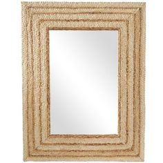 a mirror that is made out of straw