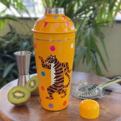 Introducing our exquisite Handpainted Cocktail Shaker, a true masterpiece that brings artistry and mixology together. This stunning shaker features a vibrant and dynamic dancing tiger, meticulously hand-painted by skilled artisans. Crafted from high-quality stainless steel, it not only adds a touch of the wild to your bar but also ensures durability for years of shaken creations. Package Contains: 1pc Handpainted Cocktail Shaker 700 ml Colour: Yellow Material: Stainless Steel Elevate your cockta Tiger Bar, Elegant Bar, Cocktail Shaker Set, Cocktail Shakers, Cocktail Set, Water Jug, Colour Yellow, Cocktail Shaker, Bar Accessories