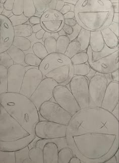 a pencil drawing of flowers and leaves on paper