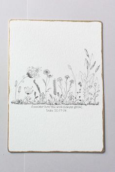 an ink drawing of wildflowers on white paper