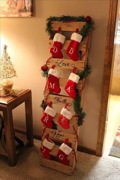 a christmas stocking rack with stockings and socks on it