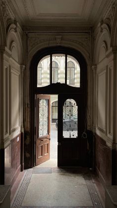 an open door leading into a large building