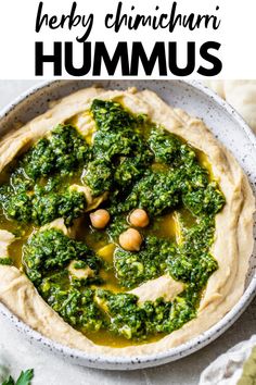 hummus with pesto and chickpeas in a bowl