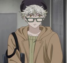 an anime character with glasses and a hoodie looks at the camera while standing in front of a building