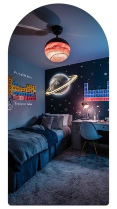 a bedroom with a bed, desk and space themed wallpaper