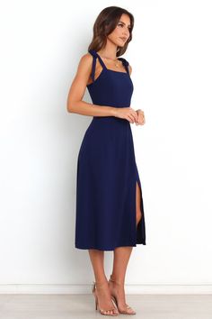 Laurel Dress - Navy - Petal & Pup USA Straight Neckline Dress With Tie Back For Date Night, Fitted Midi Dress With Tie Back And Straight Neckline, Chic Midi Length Dresses With Straps, Elegant Midi Dress With Adjustable Straps And Square Neck, Ruched Knee-length Midi Sundress, Sundress Midi Dress With Smocked Back For Date Night, Elegant Midi Length Dress With Straps, Elegant Square Neck Midi Dress With Tie Back, Midi Dress With Smocked Back For Day Out