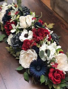 a bunch of flowers that are sitting on a table