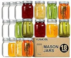 the mason jars are filled with different types of pickles