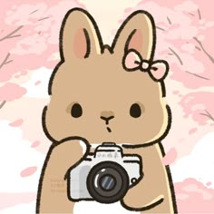 a drawing of a rabbit holding a camera