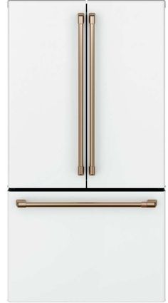 a white refrigerator freezer with two gold handles