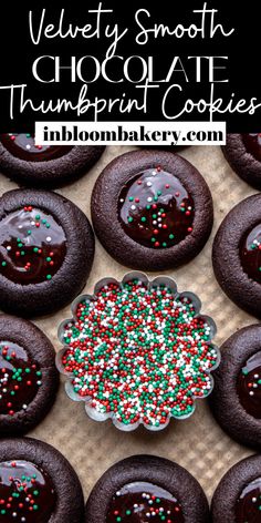 chocolate thumbnut cookies with sprinkles and chocolate frosting in the middle