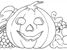 a black and white drawing of a pumpkin surrounded by grapes