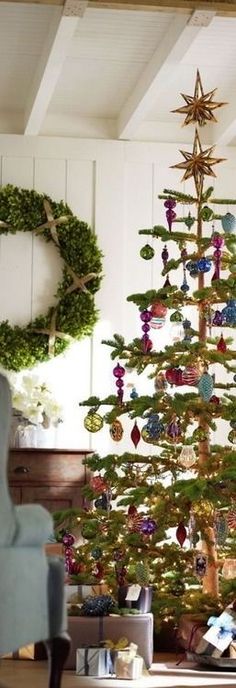 a decorated christmas tree in a living room