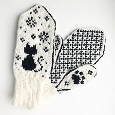 an oven mitt with black and white designs on it