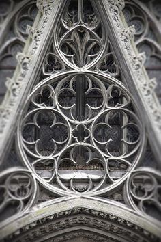 an ornate design on the side of a building