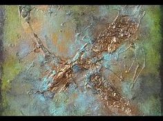 an abstract painting with gold and blue colors