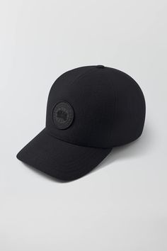 The Wool Arctic Adjustable Cap features a classic baseball hat silhouette and an adjustable strap. Crafted from 100% responsibly sourced wool, it elevates your day-to-day, every day. Hat Silhouette, Short Parka, Wool Caps, Long Parka, Boots And Sneakers, Baseball Hat, Canada Goose, Boots Men, Kids Shoes