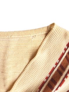 Details: Authentic 70's fitted sweater Fits like a Women's Small Small hole at shoulder on the back (see image 4 for details) Retro Cotton Sweater For Fall, Retro Stretch Knit Sweater, Retro Knit Stretch Sweater, Retro Cotton Sweater Vest For Fall, Retro Beige Knit Sweater, Retro Cotton Beige Sweater, Retro Fall Sweater, Vintage Long Sleeve Stretch Sweater, Retro Beige Cotton Sweater