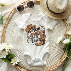 Whether you're planning a cowboy-themed photoshoot or just want to add a touch of Texas to your baby's outfit, this bodysuit is a fun and stylish choice. Get ready to say yeehaw with this adorable cowboy-inspired bodysuit! Baby Boy Cowboy Outfits, Baby Boy Cowboy, Cowboy Town, Themed Photoshoot, Western Babies, Cowboy Baby, Cowboy Outfits, Baby Cowboy, Dream Baby