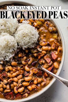 a bowl filled with black eyed peas and rice on top of a white countertop