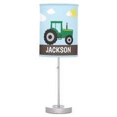 a lamp with a tractor on it that says,'jackson's farm